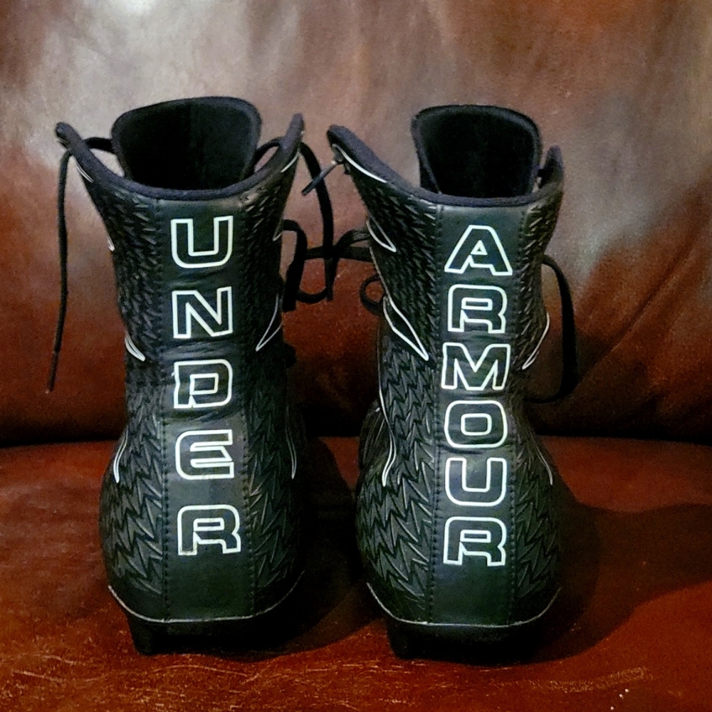 Under Armour clutch fit high top cleats. Worn 1 season.